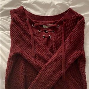 Waffle knit lace up sweater